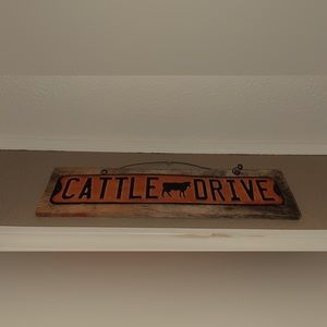 cattle drive sign found at a thrift shop.